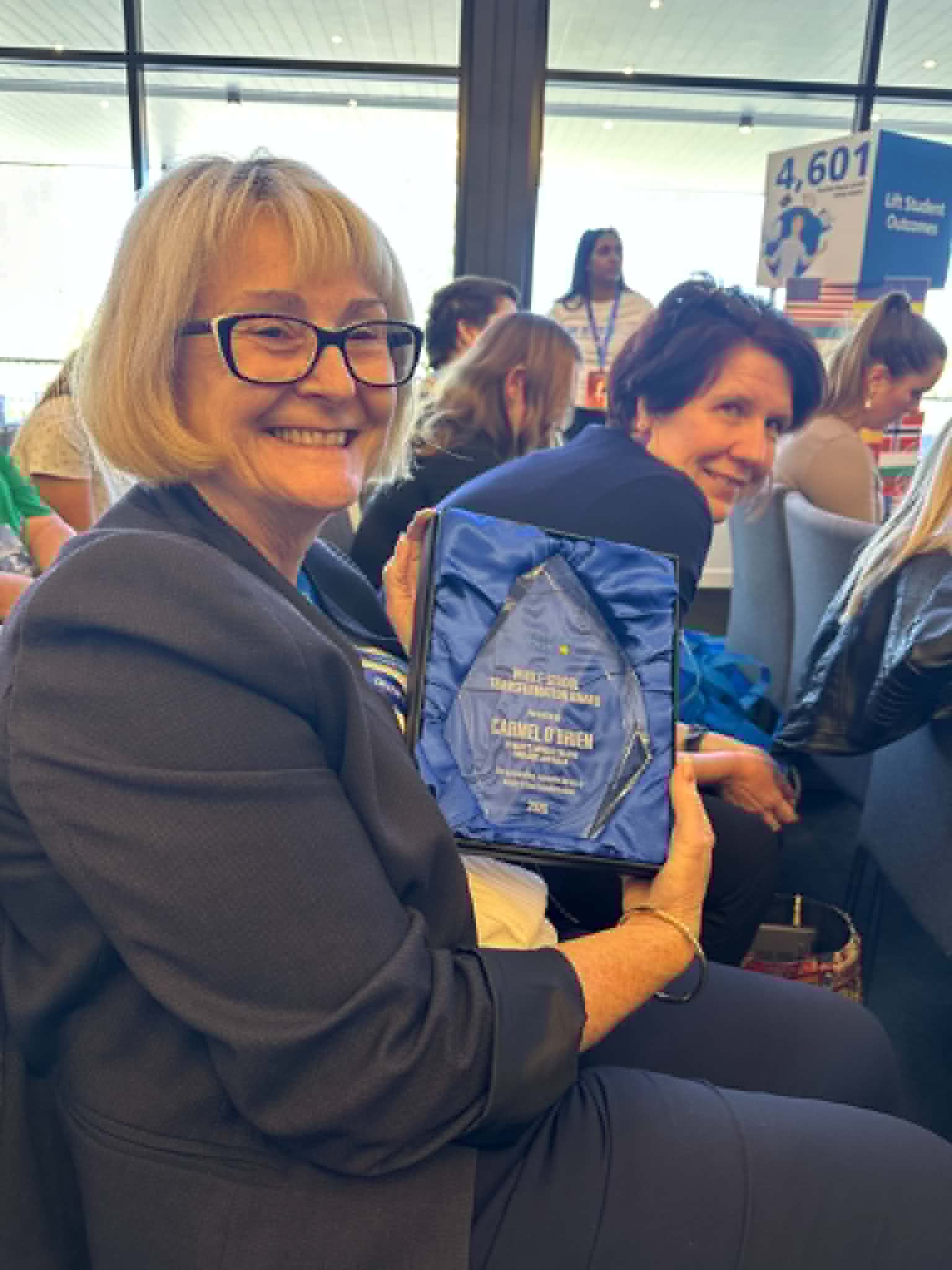 &copy; College Principal Carmel O'Brien with Whole School Transformation Award from Global Writers Toolbox Conference